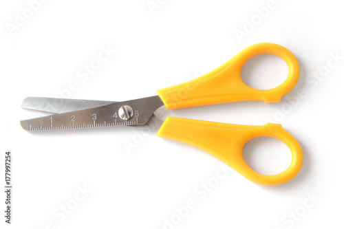 Stationery scissors with ruler on blade on white background 