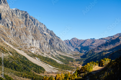 View of mountain peaks, valleys and pine tree forests in Val Ferret, Aosta Valley, Italy