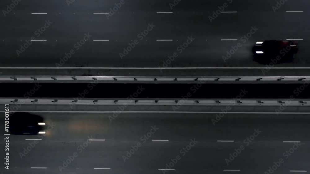 Cars on the night road. night traffic from Above. view from the air. flight on the night road Cars on the night road. night traffic from Above. view from the air. flight on the night road