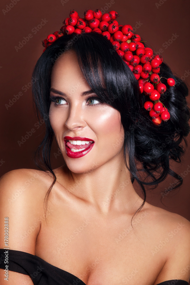 Autumn Portrait of Beautiful Woman Fashion Model with Fall Leaves and Rowan Wreath Autumn Portrait of Beautiful Woman Fashion Model with Fall Leaves and Rowan Wreath