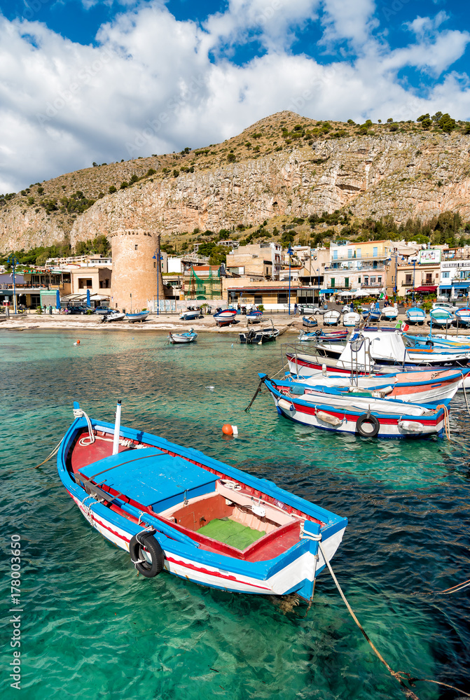Small port with fishing boats in the center of Mondello.
