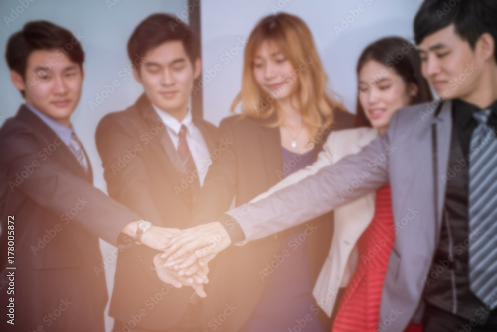 Obraz premium blurred on business team making hand coordination