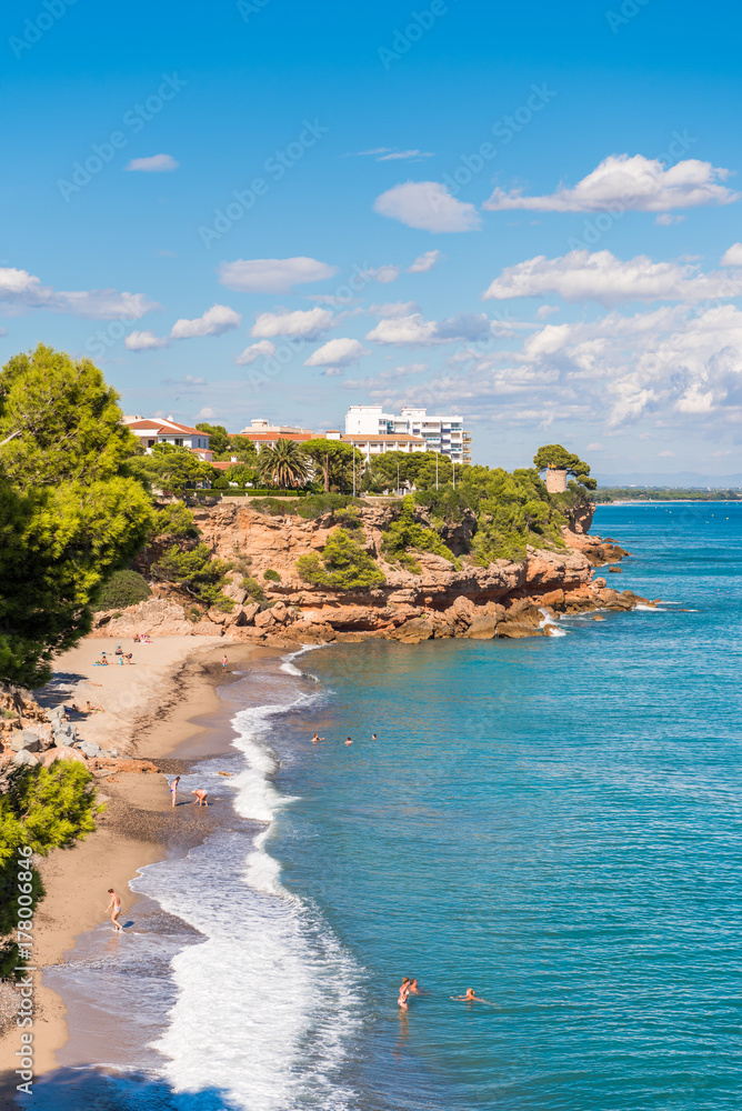 View of the coastline of the Costa Dorada in Miami Platja, Tarragona, Catalunya, Spain. Copy space for text. Vertical.