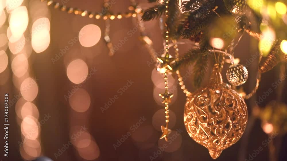 Christmas and New Year golden decoration. Abstract blinking holiday background. 4K UHD video footage. Ultra high definition 3840X2160 Christmas and New Year golden decoration. Abstract blinking holiday background. 4K UHD video footage. Ultra high definition 3840X2160