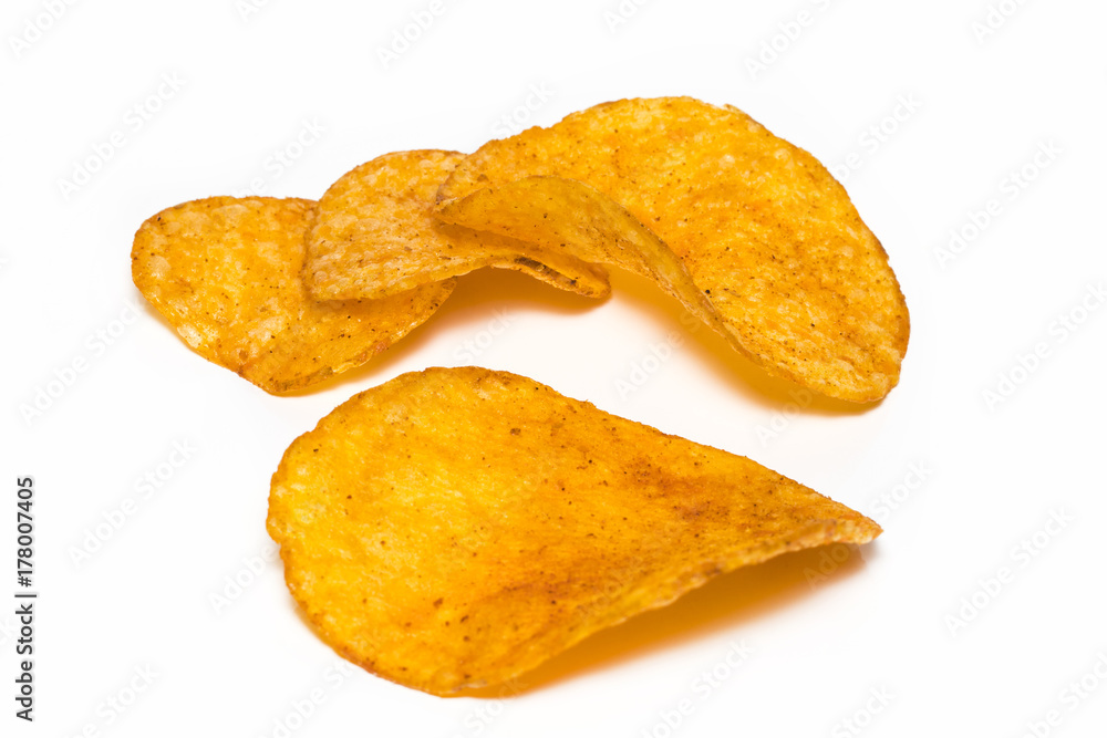 potato chips closeup isolated on a white background potato chips closeup isolated on a white background