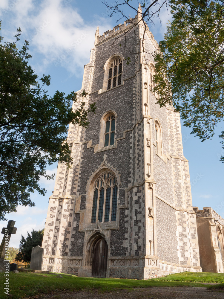 large old stone english church Alresford high in the sky spire tower full view