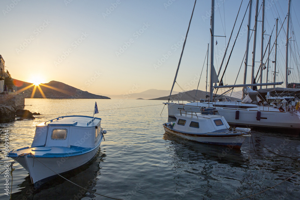 Sunrise as seen from the port of Greek island Chalki