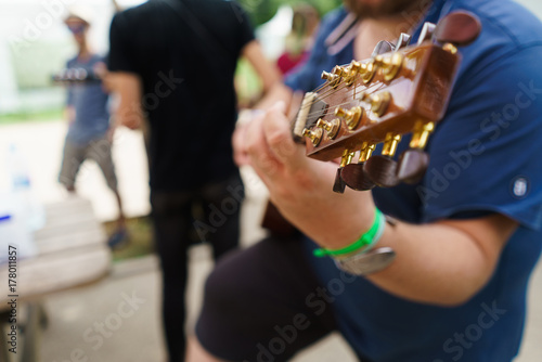 Person playing guitar