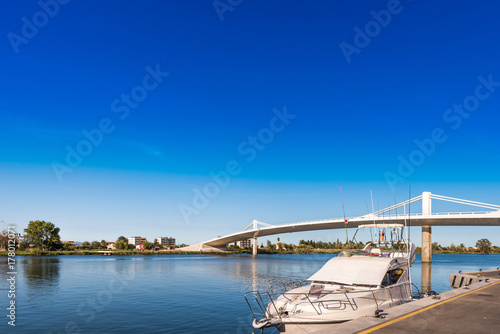 Sant Jaume d'Enveja new bridge 'Lo Passador' over Ebro river Ebro Delta, Tarragona, Catalonia, Spain. Copy space for text.