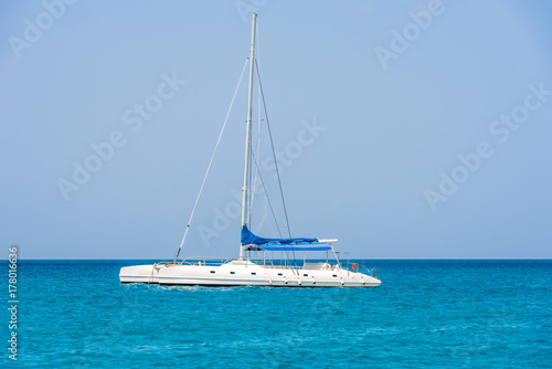 Sailing yacht on the shore of the island Saona, Dominican Republic. Copy space for text.