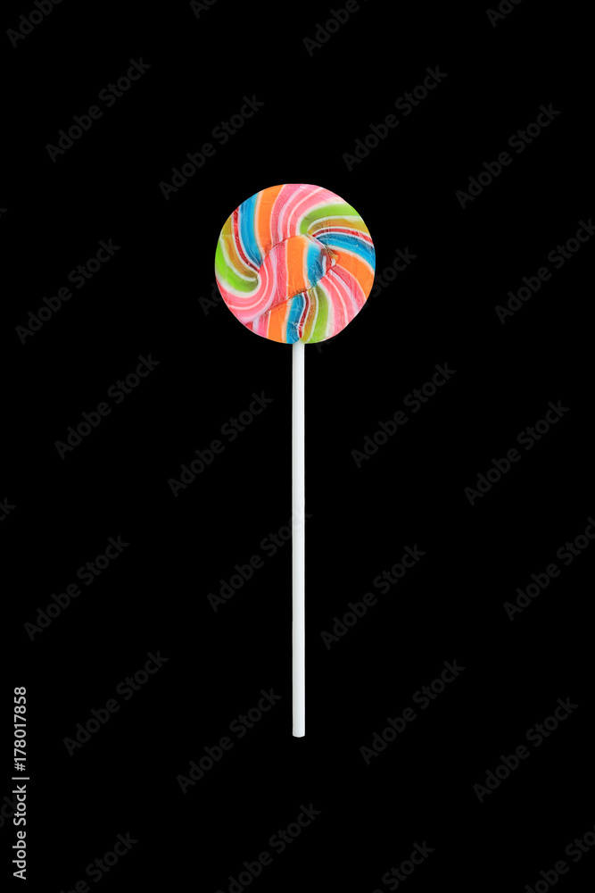 Swirl lollipop isolated on black background. Swirl lollipop isolated on black background.