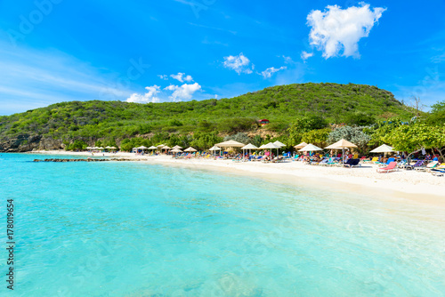 Fototapeta Naklejka Na Ścianę i Meble -  Porto Marie beach - white sand Beach with blue sky and crystal clear blue water in Curacao, Netherlands Antilles, a Caribbean Island