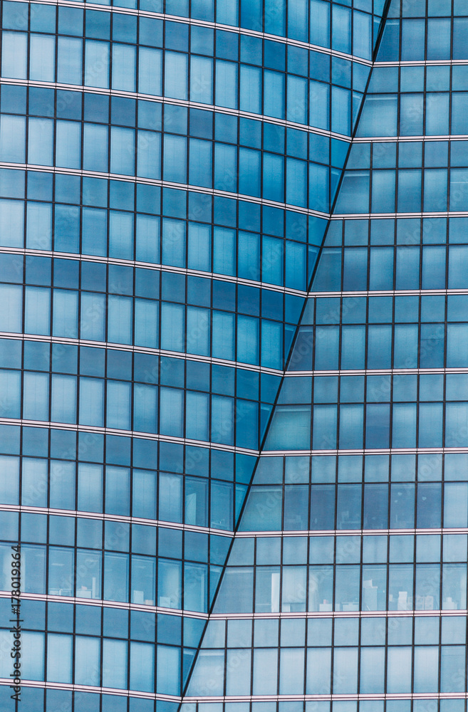 Modern building - skyscraper details on financial district of a city Modern building - skyscraper details on financial district of a city
