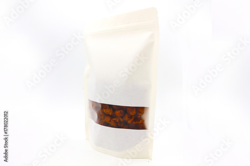 dried longan on hand fruit on white background, Dried Longans close up, Dragon eyes, Sacred fruit, dried longan product of thailand, dried longan in packaging