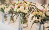 Flowers in bottles, bridal bouquets