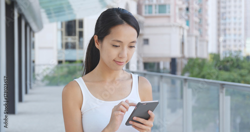 Woman use of cellphone at outdoor Free Download Woman use of cellphone at outdoor - GFXLoad