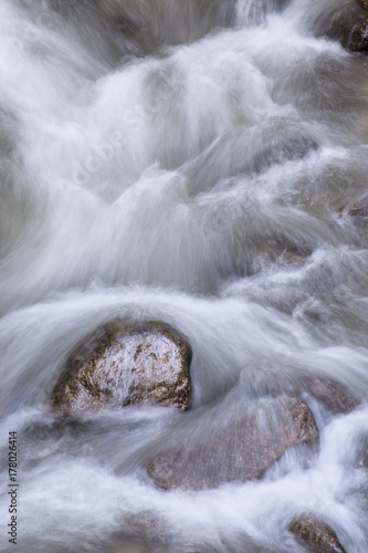 Water flowing around rocks in Roaring Fork Creek, Smoky Mountains