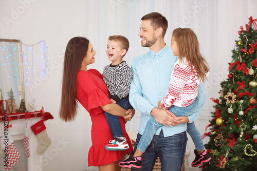 Happy family celebrating Ch...