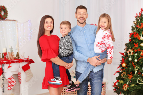 Happy family celebrating Ch...