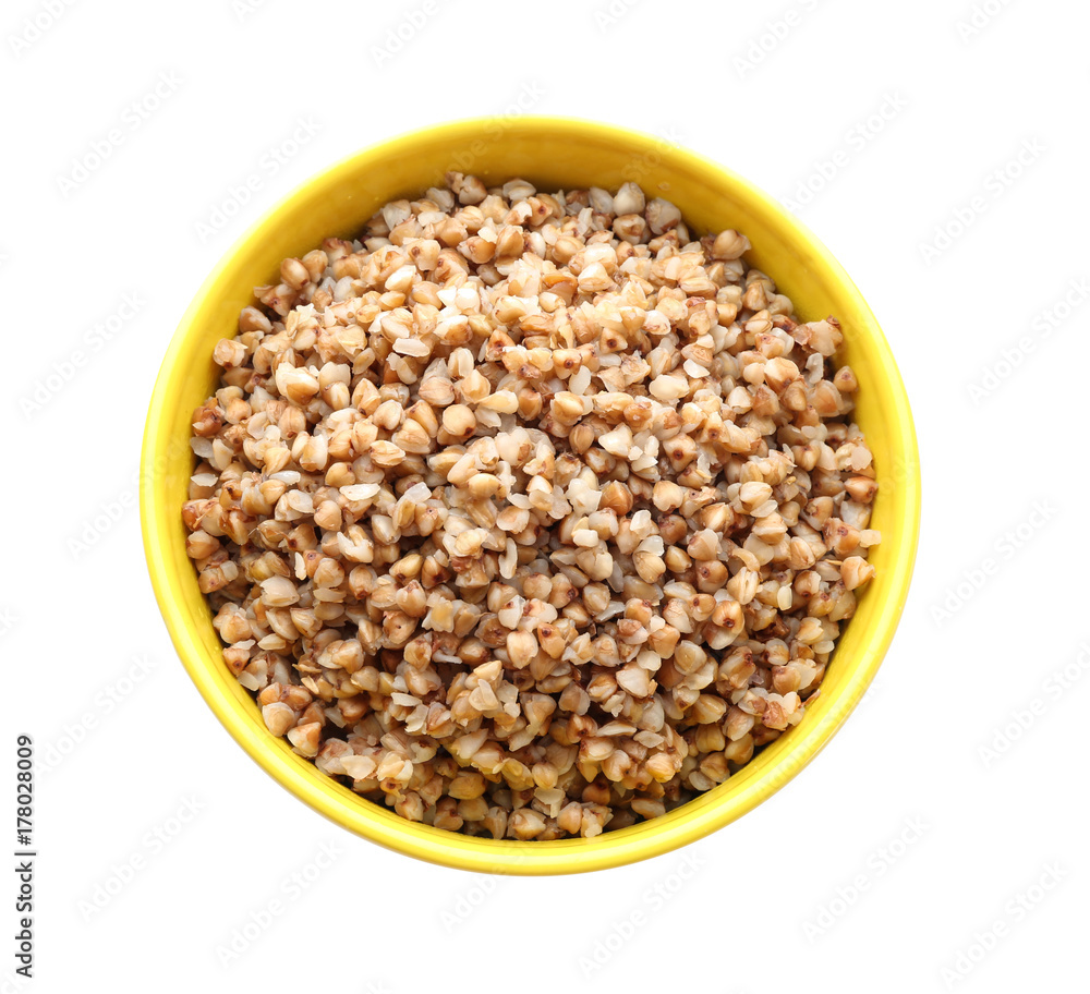 Bowl with cooked buckwheat on white background Bowl with cooked buckwheat on white background
