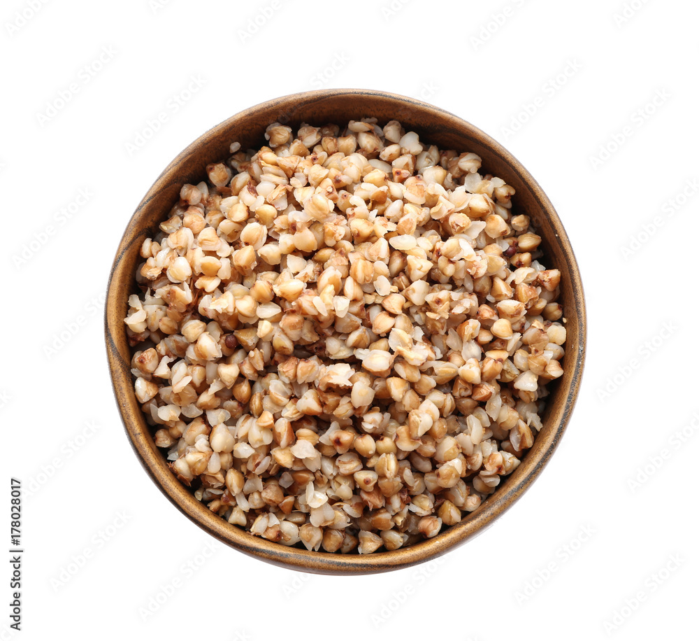 Bowl with cooked buckwheat on white background Bowl with cooked buckwheat on white background