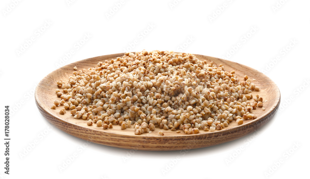 Plate with cooked buckwheat on white background Plate with cooked buckwheat on white background