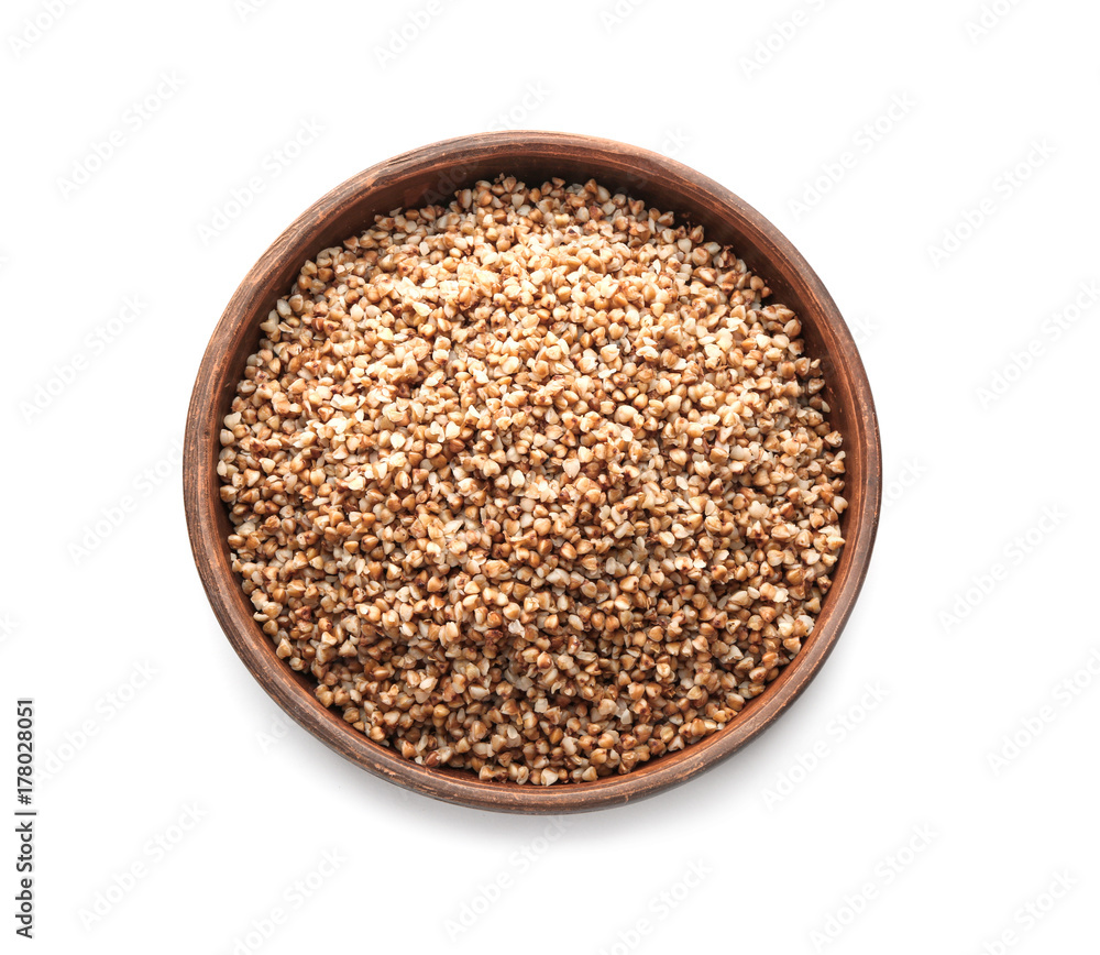 Plate with cooked buckwheat on white background Plate with cooked buckwheat on white background