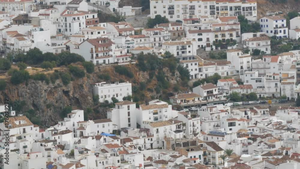 Stunning beauty of the white villages of Andalusia in Spain. Many white houses are high in the mountains,panoramic view Stunning beauty of the white villages of Andalusia in Spain. Many white houses are high in the mountains,panoramic view