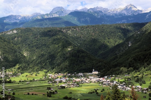 Village Srednja vas in Slovenia with Julian alps in background