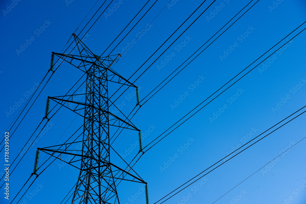 electricity transmission and blue sky at dusk , Power Tower at bangkok in thailand electricity transmission and blue sky at dusk , Power Tower at bangkok in thailand
