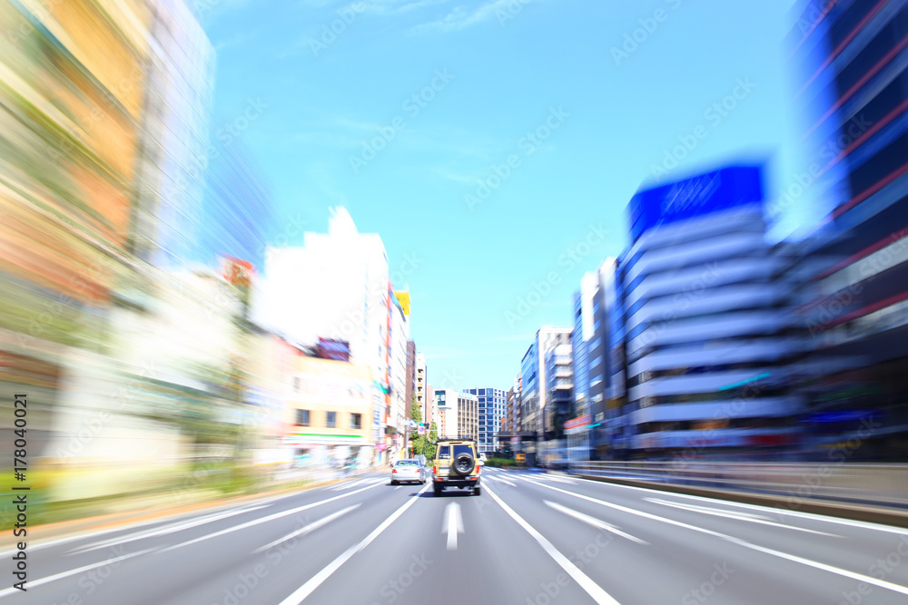 Naklejka premium Car driving fast in Tokyo