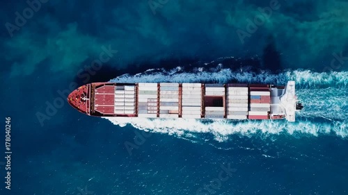 Large container ship at sea - Top down Aerial footage photo