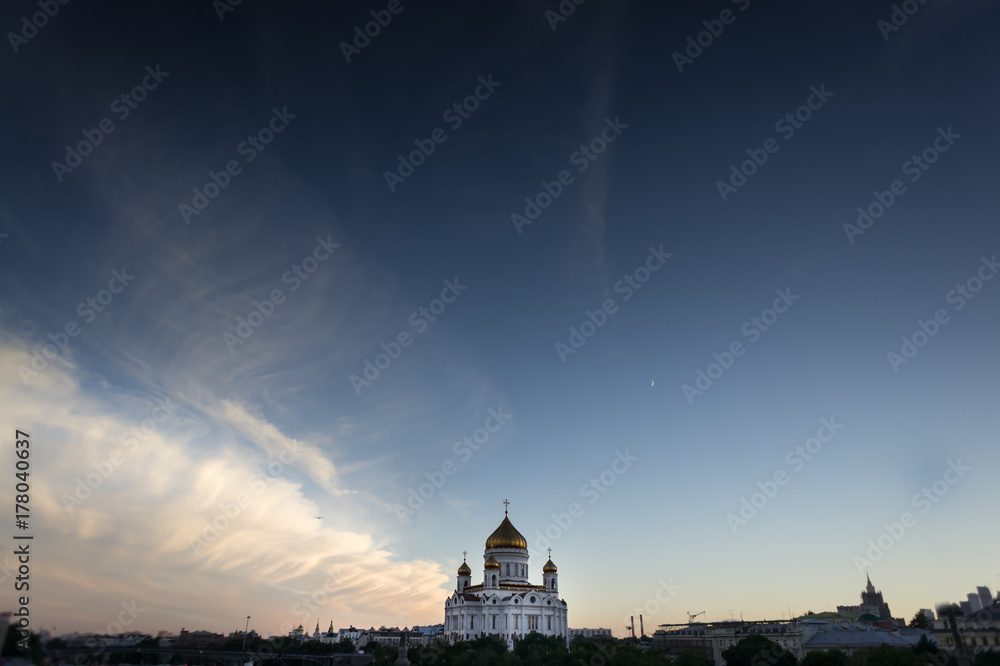 The Cathedral Of Christ The Savior and blue dark sky with white clouds. Moscow.