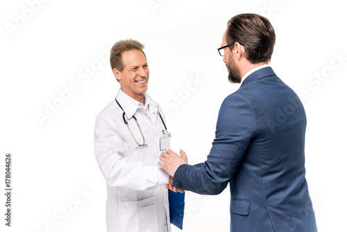 businessman and doctor shaking hands