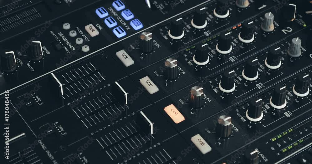 Turntable knobs and lights flashing. Close up. Turntable knobs and lights flashing. Close up.