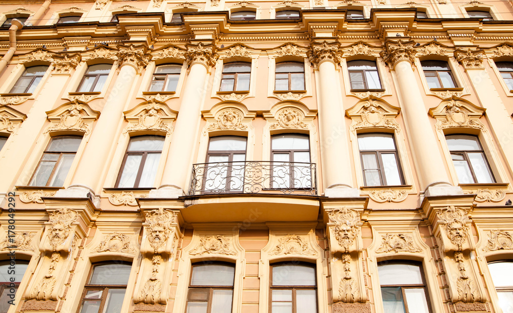 Architecture of the city. Facade of the historic building in the center of St. Petersburg, Russia
