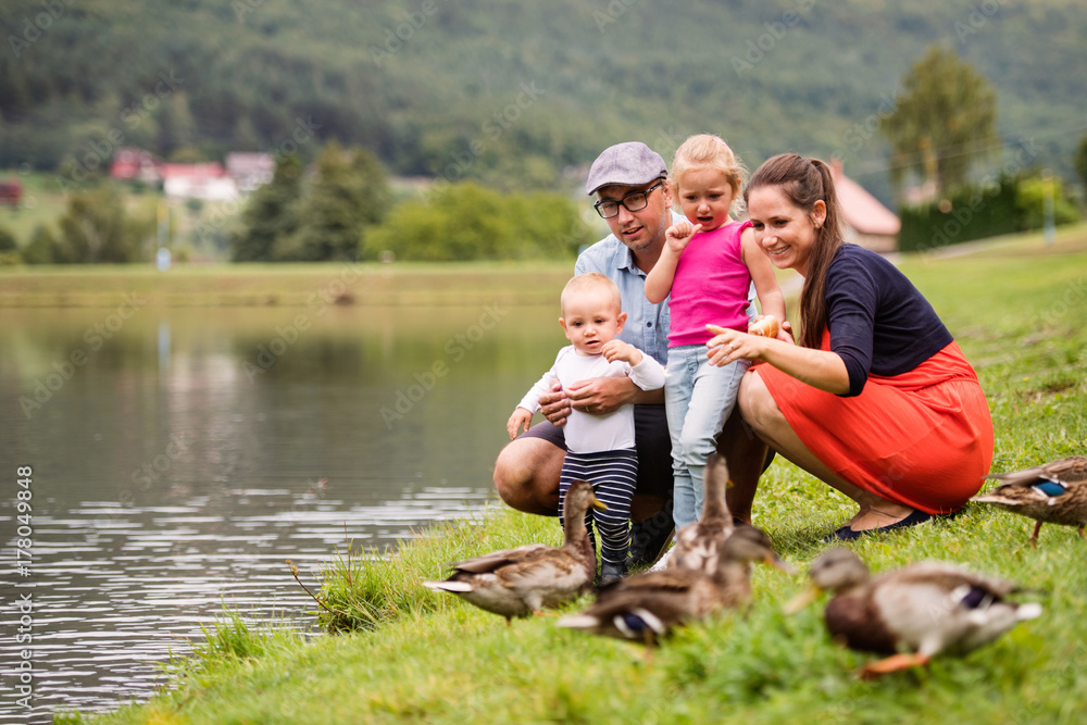 Happy family in nature in summer.