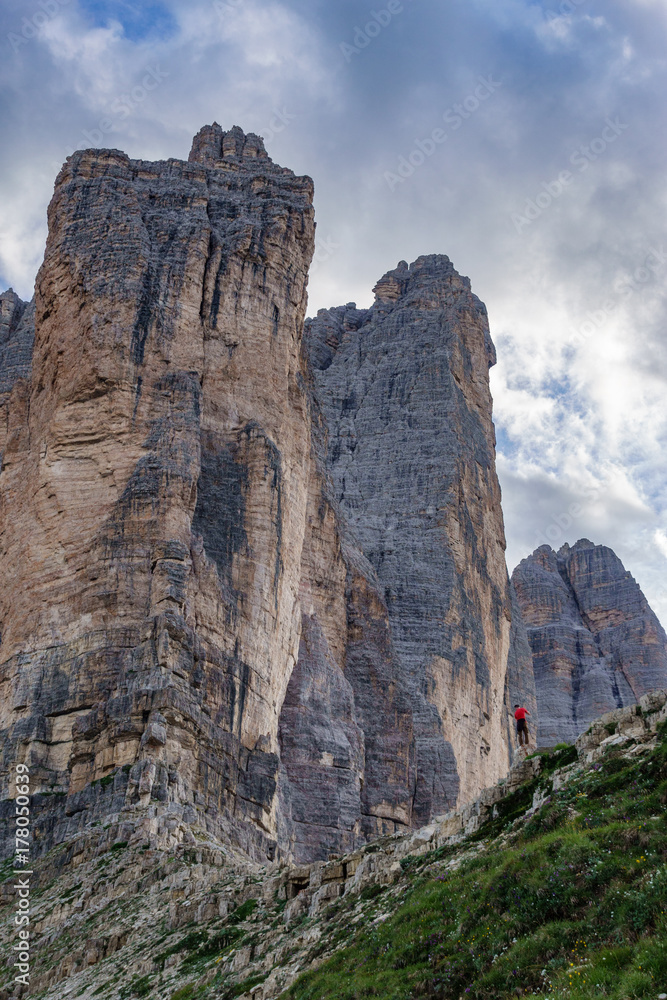Tre Cime di Lavaredo profile with tourist taking photos Tre Cime di Lavaredo profile with tourist taking photos