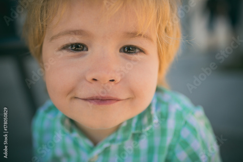 Sweet smile  boy smiling at camera  happy child is at holidays with love looking at camera. Happy childhood and positive emotions. Kind boy  love to the child. Funny face of cute toddler portrait