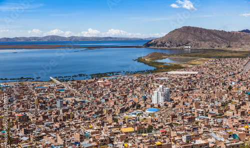Peruvian city Puno and lake Titicaca panorama, Peru