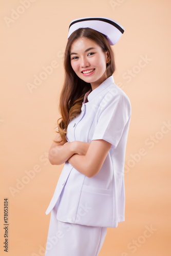 confident, happy, smiling asian nurse portrait
