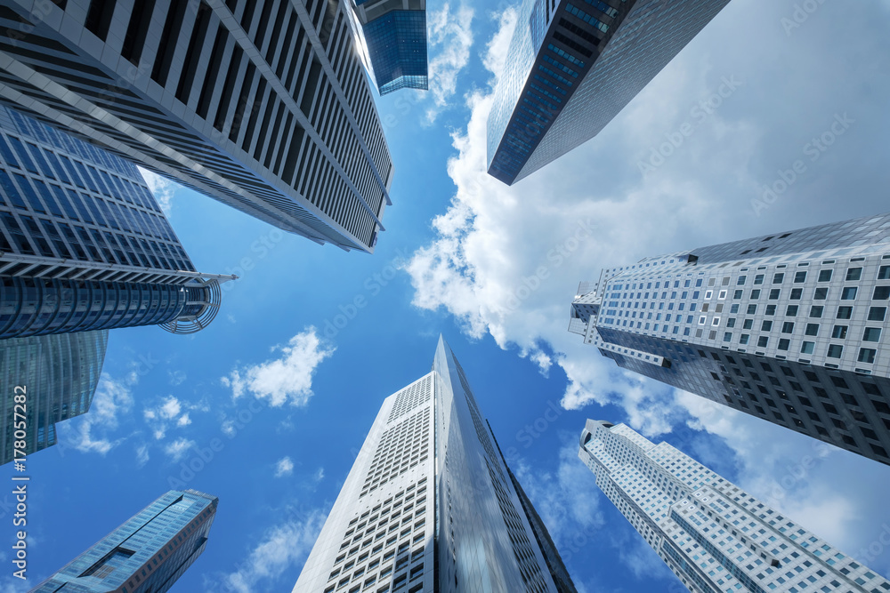 Fototapeta premium high building financial business area with cloud blue sky