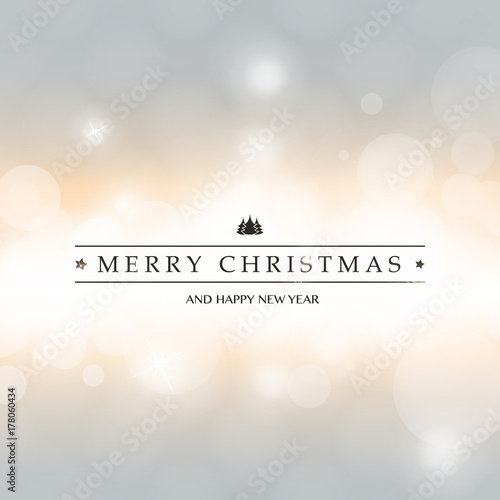 Colorful Modern Style Happy Holidays, Merry Christmas Greeting Card with Label on a Sparkling Blurred Background