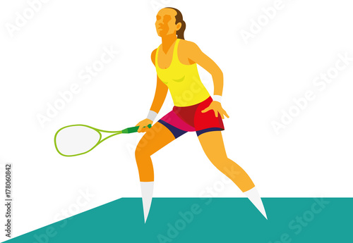 A young woman is squash player is ready to repel a difficult ball