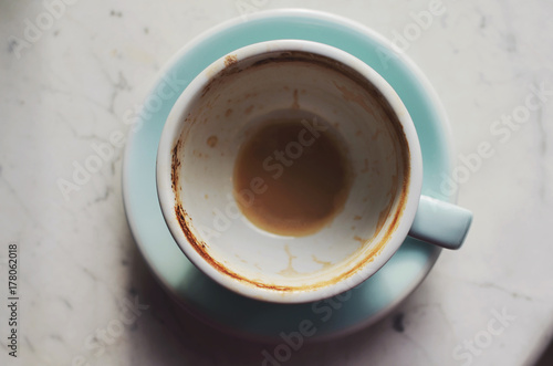 Empty coffee cup on marble background