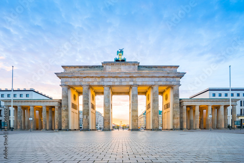 Sunrise at Berlin city with Brandenburg gate in Berlin, Germany photo