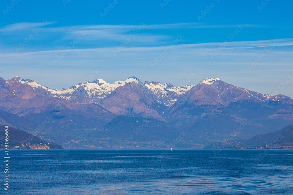Lake Como with snow mountain in background Lecco, Lombardy, Italy