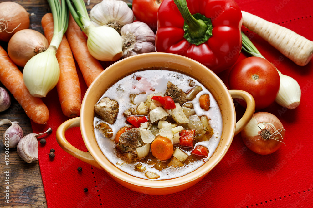Goulash soup with fresh vegetables and meat Goulash soup with fresh vegetables and meat