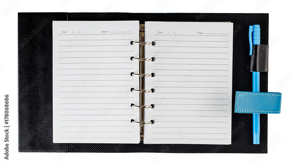 Notebook open with pen Notebook open with pen