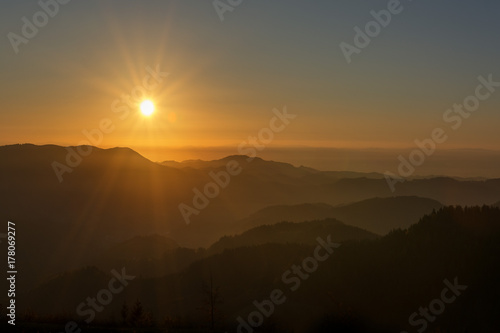Wallpaper Mural Autumn landscape - Black Forest. Panoramic view over the autumnal Black Forest, the Rhine valley and the Vosges (France) in the distance at sunset. Torontodigital.ca